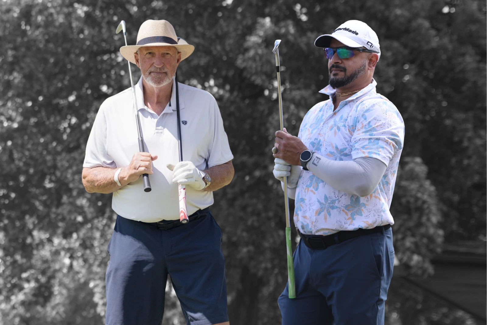 Lord Ian Botham and Kartik Murali playing golf at the Fairway Masters